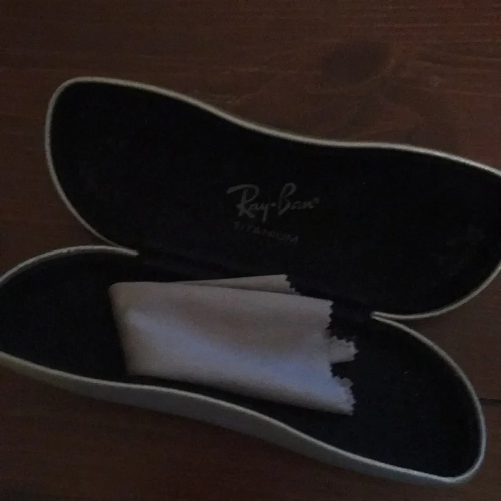 Silver Gray Ray-Ban titanium sunglasses eyeglasses case w/ marks on back bottom